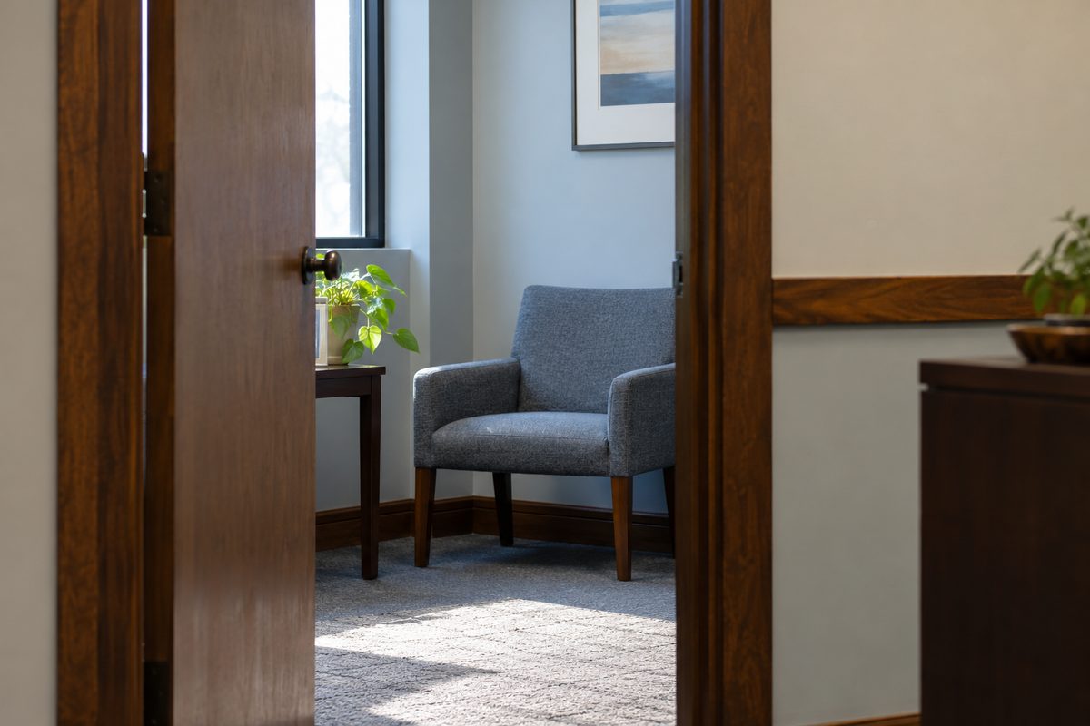 Open doorway and waiting chair in the Bridgeport law office